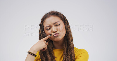 Buy stock photo Touch cheek, silly and woman in studio for funny face, humor and comedy on white background. Cute, mockup space and isolated person with positive attitude, facial expression and pointing for emoji