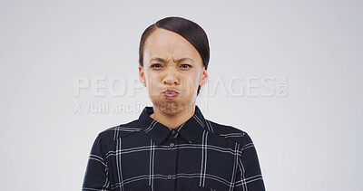 Buy stock photo Woman, funny face and cheeks in studio, blow raspberry or joke with mockup space on white background. Person, comic expression and silly with lips, portrait and mouth with goofy emoji in Puerto Rico