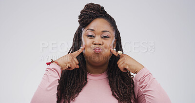 Buy stock photo Silly, portrait or woman with funny face, facial expression or gesture for humor, studio and comic. White background, personality or black person with reaction for comedy, goofy or confident in Kenya
