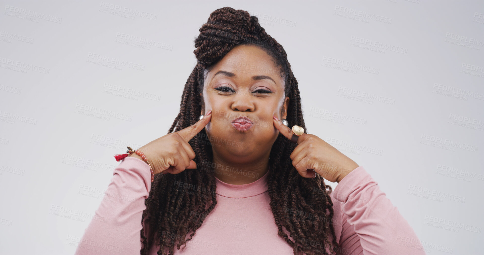 Buy stock photo Silly, portrait or woman with funny face, facial expression or gesture for humor, studio and comic. White background, personality or black person with reaction for comedy, goofy or confident in Kenya