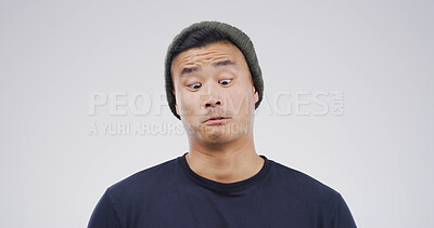 Buy stock photo Comic, funny face and goofy with man on studio space for emotions, humor or silly joke. Comedy, emoji and unique with Asian person isolated on white background for quirky expression or reaction