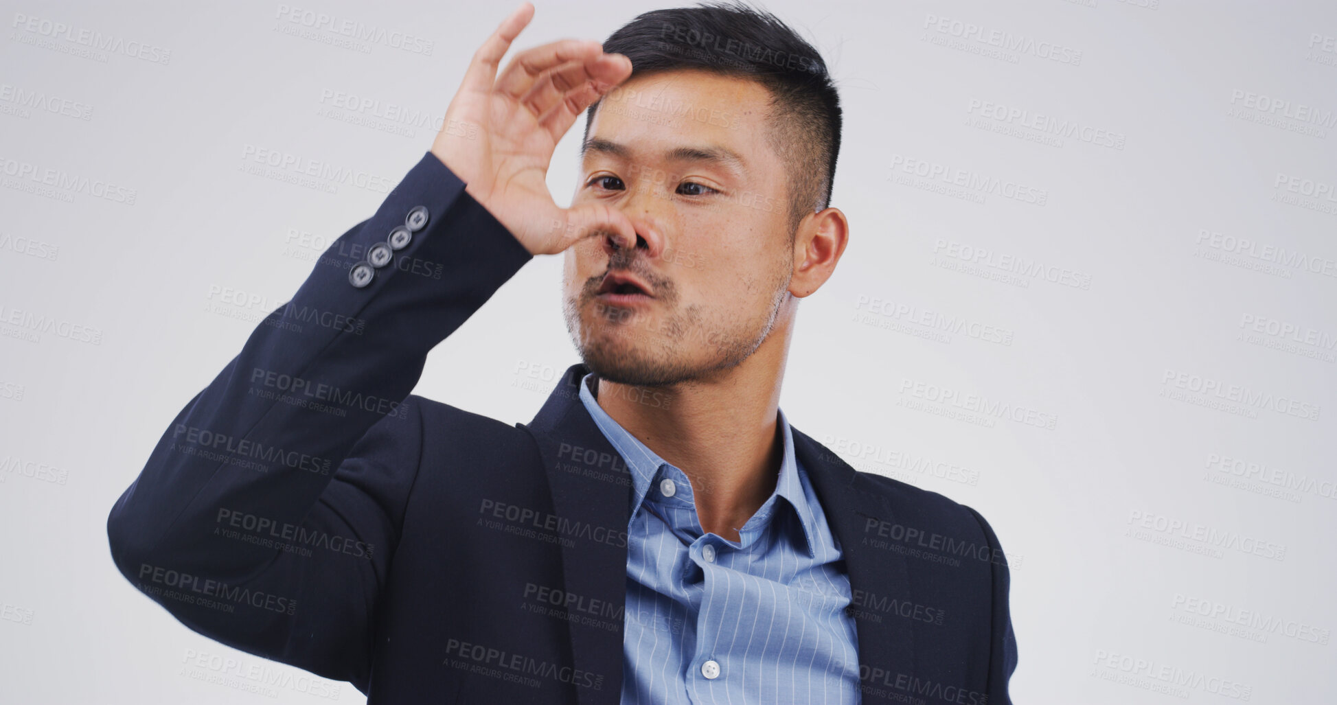 Buy stock photo Comedy, funny face and nose with business man on studio space for insult, mocking or ridicule. Comic, facial expression and rude with Asian employee isolated on white background for emoji reaction