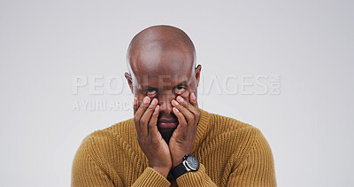 Buy stock photo Tired, frustrated and portrait of black man in studio for mistake, annoyed and anxiety. Stress, mental health and risk with male person on white background space for worry, brain fog and burnout