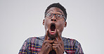 Goofy, black man and portrait with funny face or tongue out for joke on a white studio background. Male person, silly model or humor with glasses, comic or quirky for crazy or comedy on mockup space