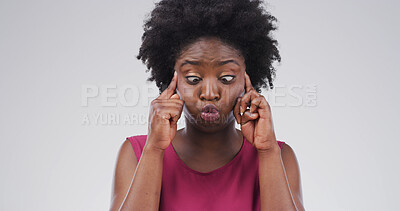 Buy stock photo Cross eyes, silly and black woman in studio with funny face for emoji, comedy and humor. Mockup space, happy and isolated person with funny face, crazy and goofy expression on white background