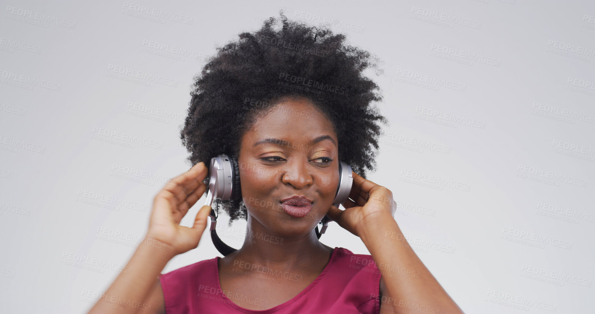 Buy stock photo Black woman, headphones and listen to music in studio with album, streaming or song on white background. African person, playlist and mockup space for audio subscription, radio and hearing hifi sound