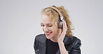 Happy, woman and headphones with music in studio for streaming subscription, radio and playlist. Mockup space, girl and smile with technology on white background for sound track or listening to audio