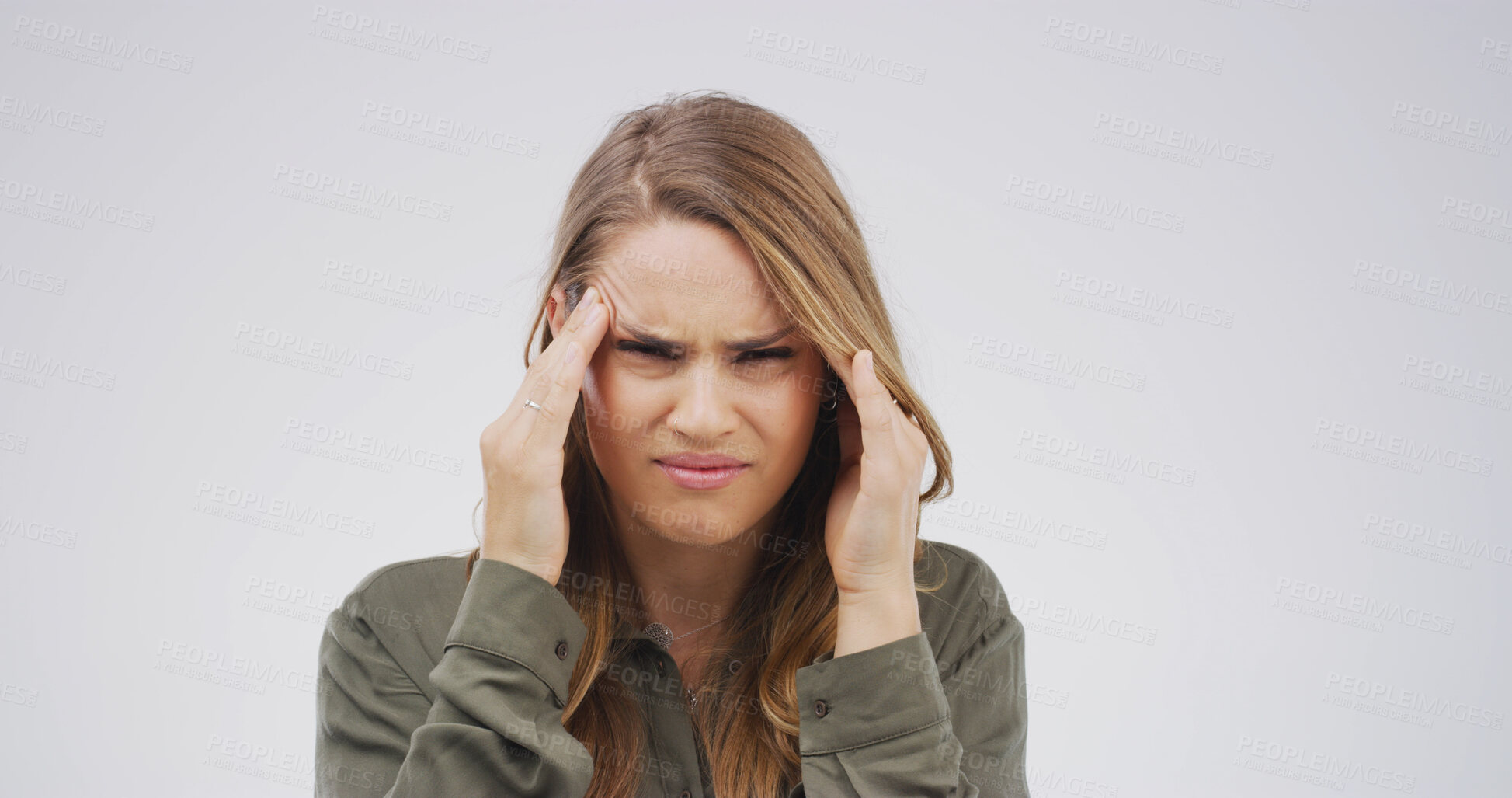 Buy stock photo Pain, portrait and woman with headache in studio from mental health fatigue, anxiety or brain fog. Mockup space, frustrated girl or tension migraine on white background with stress and massage temple