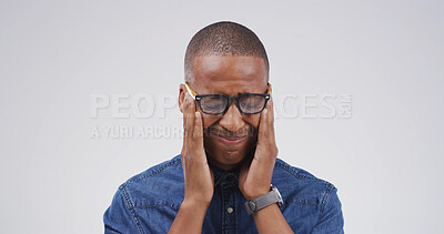 Buy stock photo Black man, headache and glasses with pain in studio with mockup space, tired or vertigo on white background. Person, chronic migraine and burnout with brain fog, eye fatigue and temple massage
