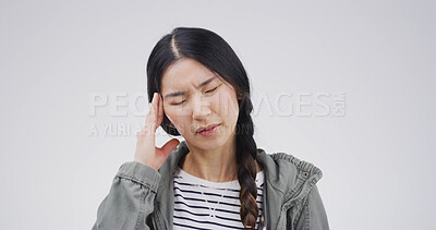 Buy stock photo Tension, pain and girl with headache in studio from mental health fatigue, stress and vertigo. Mockup space, person and pressure migraine on white background with dizziness, illness and overwhelmed
