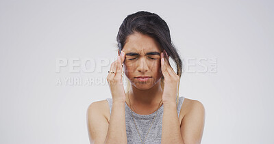 Buy stock photo Pain, pressure and girl with headache in studio from stress, hypertension or overwhelmed by strain. Mockup space, woman and migraine on white background with discomfort, mental health and dizziness