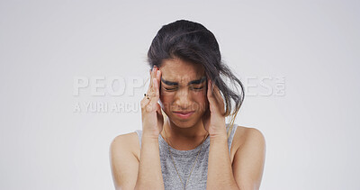 Buy stock photo Student, anxiety and girl with headache in studio for college stress, workload fatigue or overwhelmed. Mockup, person or tension migraine on white background for education burnout, tired or brain fog