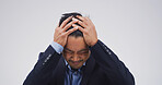 Stress, headache and business man in studio for debt crisis, emergency and stock market crash. Investment mistake, fear and credit rejection with frustrated person on white background space for risk