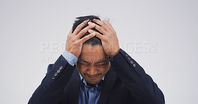 Buy stock photo Stress, headache and business man in studio for debt crisis, emergency and stock market crash. Investment mistake, fear and credit rejection with frustrated person on white background space for risk