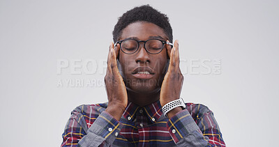 Buy stock photo Headache, glasses and black man in studio with eye strain for migraine, brain fog and pressure. White background, mockup space and frustrated person with stress for tension, head pain and burnout