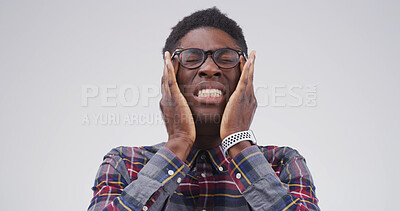 Buy stock photo Headache, glasses and upset black man in studio with eye strain for migraine, brain fog and pressure. White background, mockup space and frustrated person with stress for tension, fatigue and burnout
