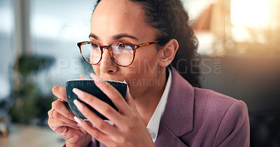 Buy stock photo Woman, business and drinking coffee in office with glasses, morning routine and reading on computer. Professional, reflection or mug in workplace for article review, email or journalist at technology