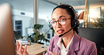 Woman, consultant or talking with headset at call center for communication, online advice or help. Female person, agent or employee explaining with mic on technology for virtual assistance or CRM