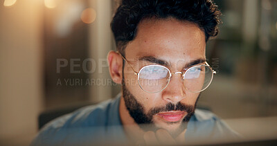 Buy stock photo Computer, man and coder with glasses in office with web development, cybersecurity or tech project. IT, problem solving and programmer with brainstorming for cloud computing in workplace at night.