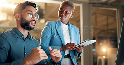 Buy stock photo Conversation, night and tablet with business people in office together for development or planning. Explain, feedback or review with employee man and woman in workplace for project management