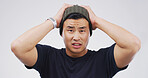 Mistake, portrait and reaction with man on studio space for crisis, exam fail or test error. Bad news, disaster and education with Asian student isolated on white background for college or university