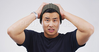 Buy stock photo Mistake, portrait and reaction with man on studio space for crisis, exam fail or test error. Bad news, disaster and education with Asian student isolated on white background for college or university