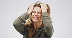 Woman, frustrated and screaming with stress, crisis and isolated on white background with anxiety. Depression, psychology and shout with angry female person in studio for mental health and rage