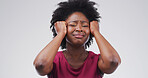 Crying, sad and face of black woman in studio with reaction, emotional and upset for bad news. Mockup space, white background and isolated person with disappointed, frustrated and worry for mistake
