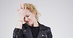 Headache, stress and woman in studio, pain and mental health on white background. Mockup space, discomfort and person with migraine, brain fog and burnout with anxiety, frustrated and fatigue