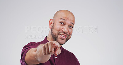 Buy stock photo Portrait, pointing to you and man in studio, choice and encouragement on white background. Mockup space, gesture and person with happiness, support or decision with selection, attention or invitation