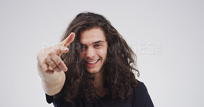 Buy stock photo Portrait, pointing to you and man in studio, decision and rock star on white background. Mockup space, gesture and person with happiness, artist or choice with selection, creative and opportunity