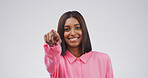 Portrait, pointing to you and woman in studio, selection and encouragement on white background. Mockup space, gesture and happy person with feedback, opportunity and decision with choice and offer