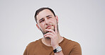 Planning, thinking and question with man on studio space for brainstorming, contemplation or solution. Ideas, problem solving and why with person isolated on white background for choice or decision