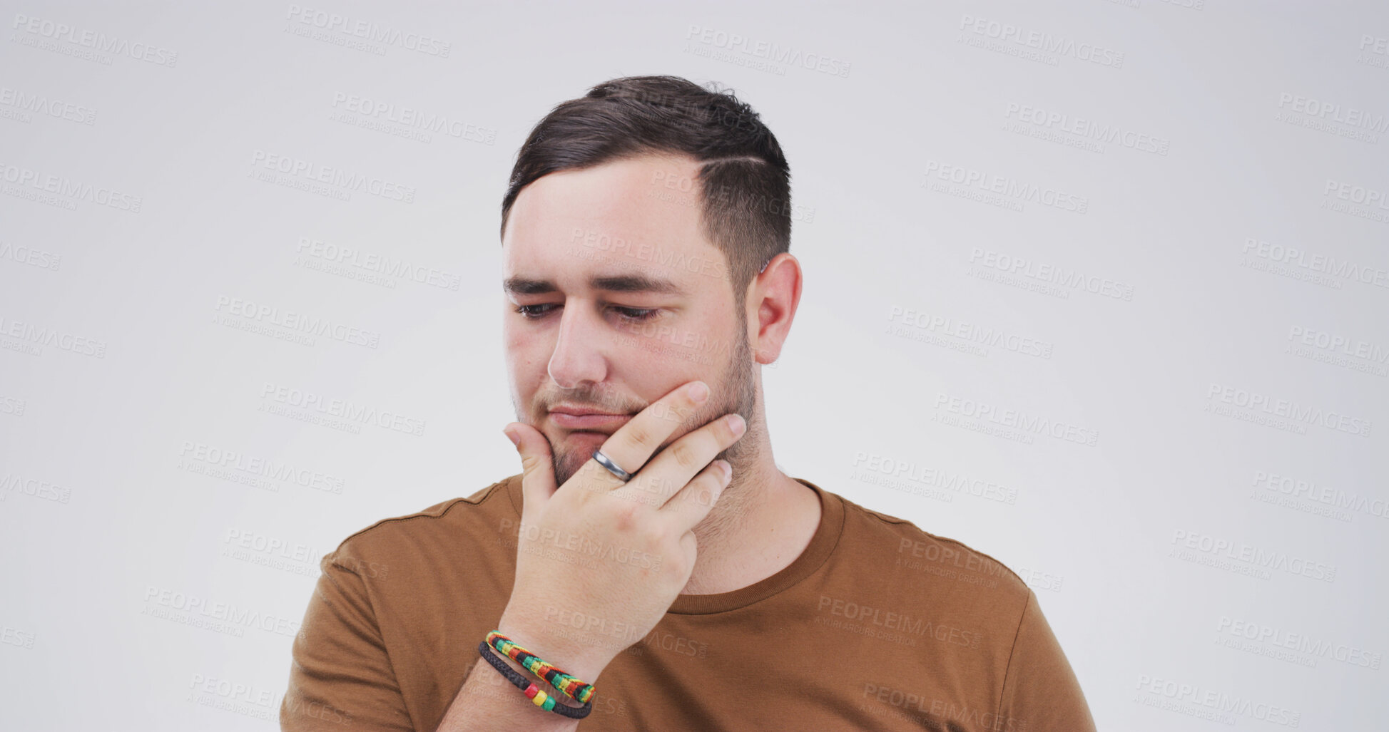 Buy stock photo Studio, thinking and man with doubt, confused or facial expression for question, unsure or decision. Contemplating, serious and person with gesture for memory loss, uncertain and white background
