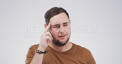 Buy stock photo Studio, thinking and man with question, confused or facial expression for doubt, unsure or decision. Contemplating, serious and person with gesture for memory loss, uncertain and white background