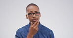 Portrait, thinking and black man with question in studio for why, suspicious and solution to doubt. Mockup space, person and wondering on white background for fake news gossip, uncertain and puzzled