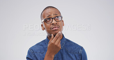 Buy stock photo Thinking, question and why with black man on studio space for brainstorming, contemplation or solution. Glasses, ideas and planning with person isolated on white background for choice or decision