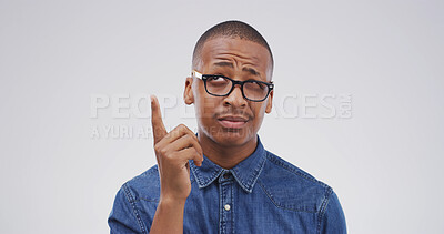 Buy stock photo Confused, black man and thinking with solution in studio for conclusion, problem solving and aha. Space, frown and person with remember on white background with eureka moment, insight and revelation