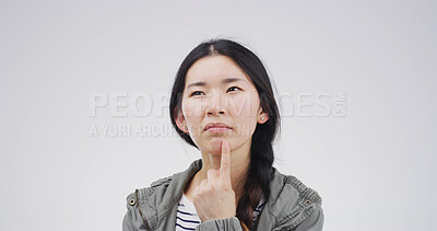 Buy stock photo Choice, idea and thinking with woman on studio space for brainstorming, contemplation or wonder. Decision, vision and why with face of Asian person isolated on white background for thoughtful plan