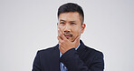 Business man, thinking and solution in studio, insight or problem solving on white background. Asian person, corporate lawyer or attorney with perspective, reflection or mockup space for legal career