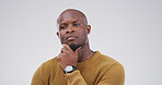 African man, thinking and decision in studio with mock up space, confused or doubt on white background. Person, perspective and insight for option, solution or choice with mindset for problem solving