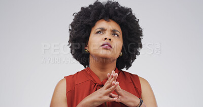 Buy stock photo Thinking, confused and black woman in studio, decision and contemplation on white background. African person, hands together or problem solving with doubt, choice or wonder with solution or uncertain