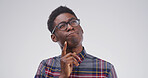 African man, thinking and student in studio with mock up space, confused or doubt on white background. Person, nerd and perspective for education, solution or choice with mindset for problem solving