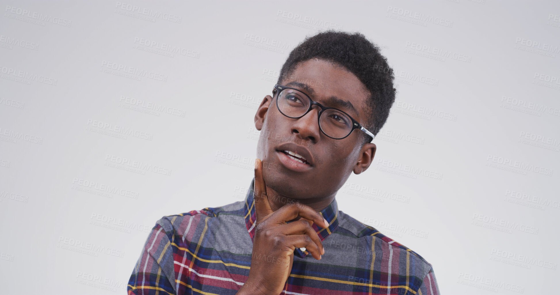 Buy stock photo Black man, thinking and college student in studio, confused or doubt with mockup space on white background. African person, nerd and insight for learning, solution or choice for university education