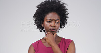Buy stock photo Confused, doubt and woman with thinking in studio for decision, planning and solution to question. Mockup, black person and frown on white background for fake news gossip, suspicious or contemplating