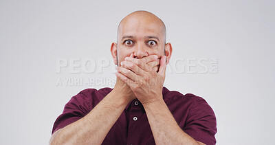 Buy stock photo Portrait, man and shocked expression in studio for gossip reaction, bad news and fake rumor. Male person, space and cover mouth for horror story, scary drama and secret revelation on white background