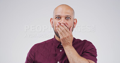 Buy stock photo Surprise, studio and portrait of scared man with fear, mind blown or secret on white background. Shock, person and cover mouth with face expression for fake news, danger and wtf with horror story