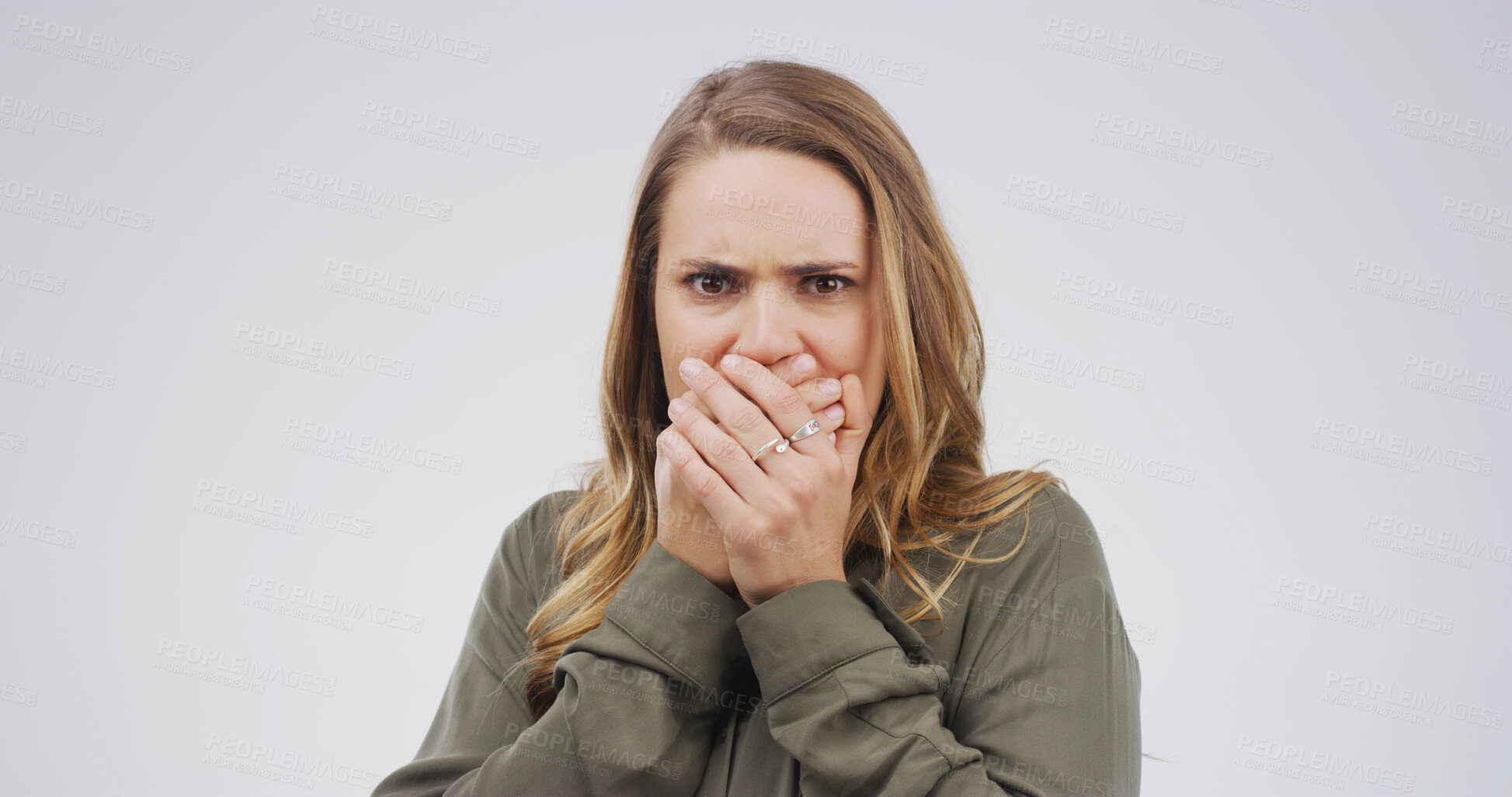 Buy stock photo Scared, shocked and portrait of woman in studio with omg, wtf or wow reaction for news. Emotion, surprise and female person with hands covering mouth for rumor or announcement by white background.