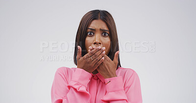 Buy stock photo Anxiety, shocked and portrait of woman in studio with omg, wtf or wow reaction for news. Scared, surprise and female person with hands covering mouth for rumor or announcement by white background.