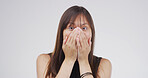 Wow, cover mouth and woman with fear for terror or wtf on white studio background space. Shock, surprise and portrait of person with face expression for fake news, danger or scared with horror story